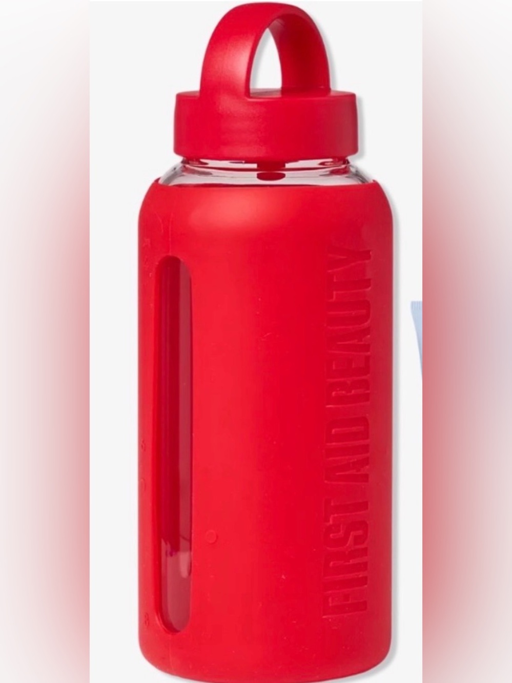 First Aid Beauty Glass with Red Silicone Sleeve Bottle